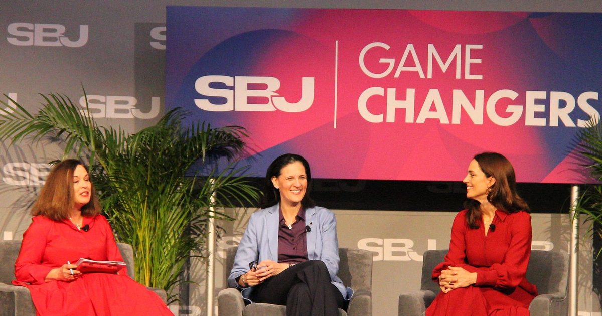 Three women seated on the Game Changers stage during the Bridging the Gap session